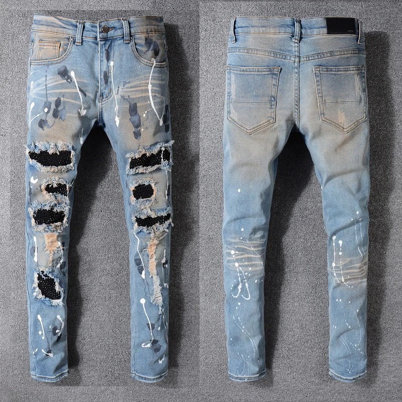 AMIRI Paint Splatter Distressed Ripped Denim Jeans