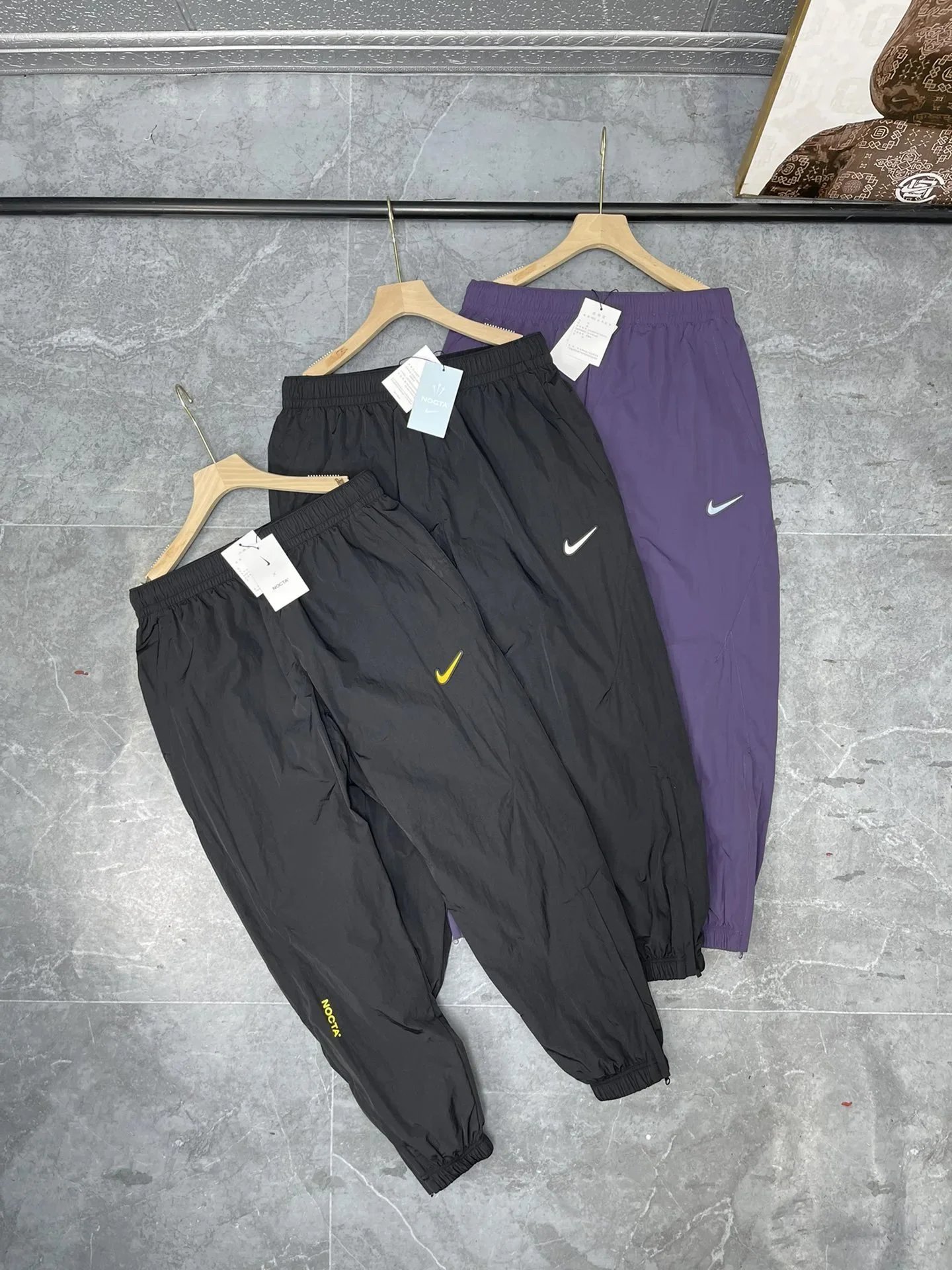 Nike Woven Track Pants with Elastic Cuffs and Swoosh Logo
