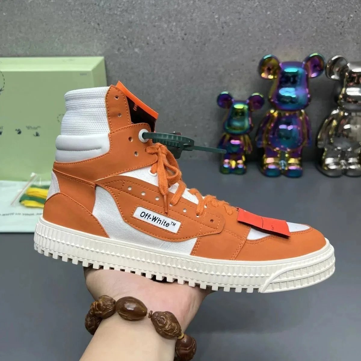 Off-White High-Top Sneaker with Signature Zip Tie and Logo Patch