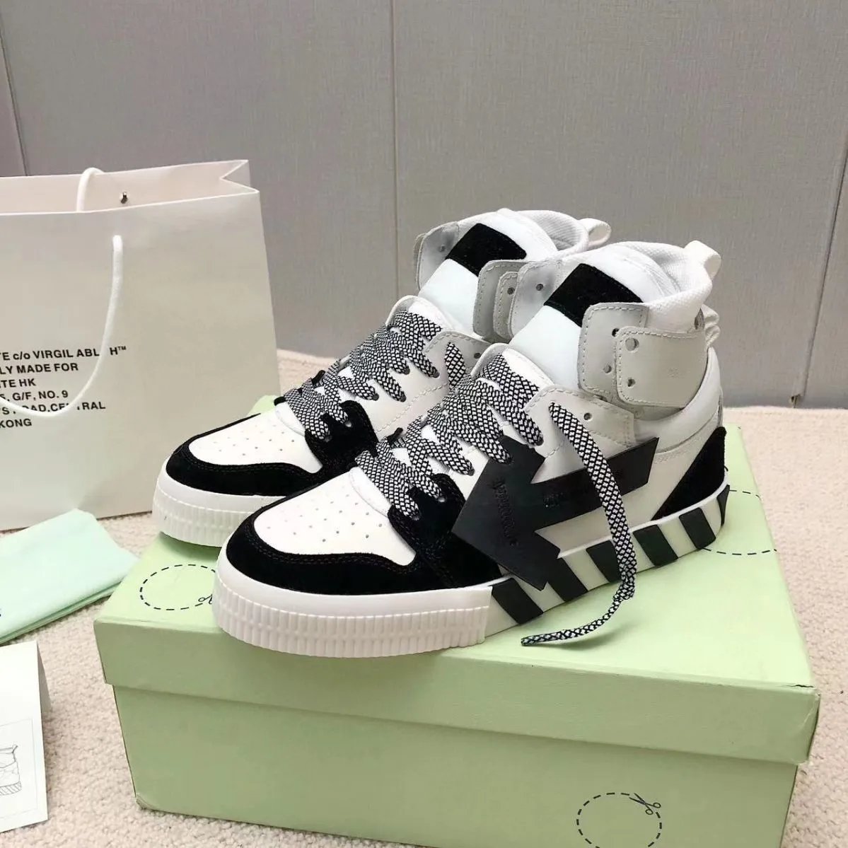 Off-White High-Top Sneakers with Arrow Tag and Diagonal Stripes