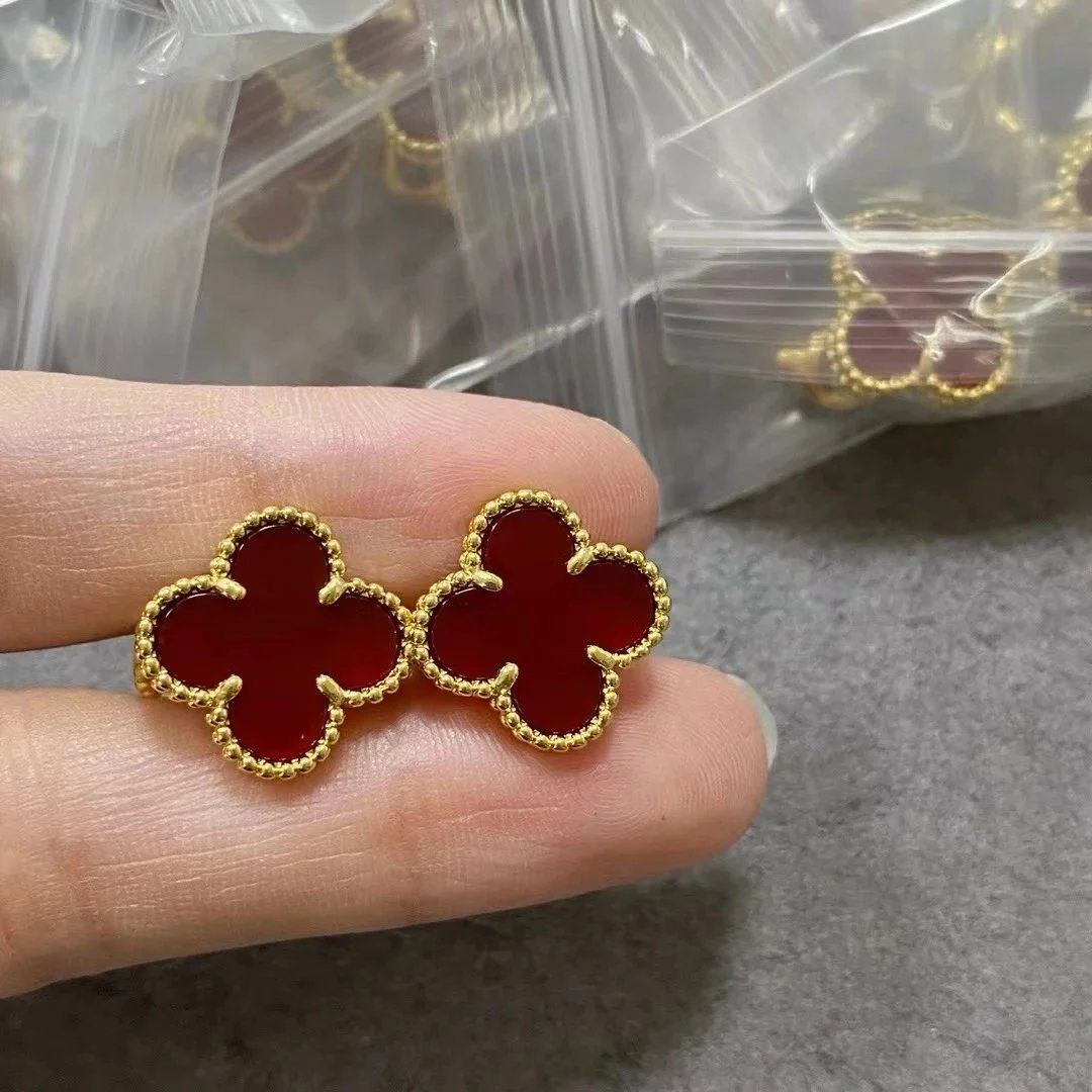Gold Tone Clover Stud Earrings with Red Stone and Beaded Edge