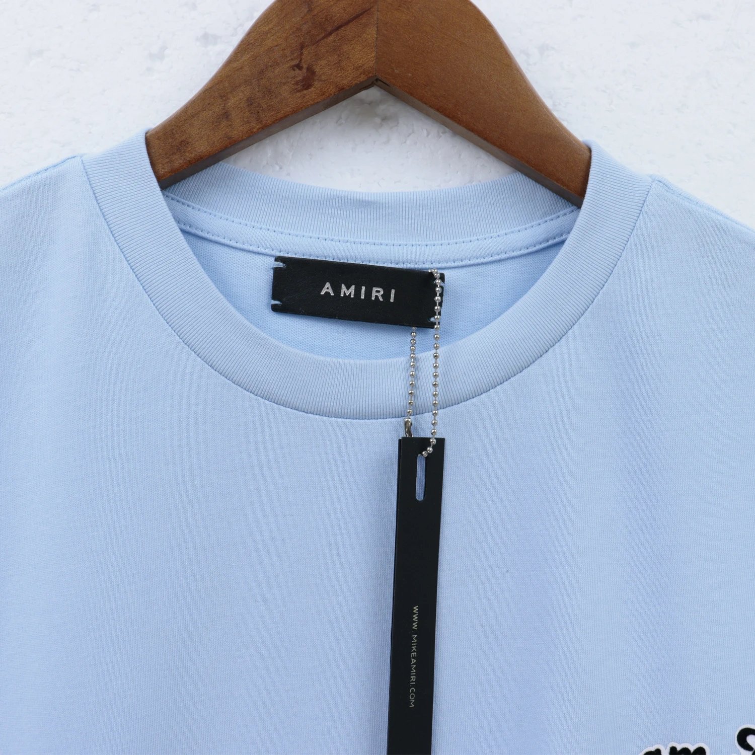 Amiri Flocked Emblem T-Shirt Blue - Gallery Image 6 - Detailed View