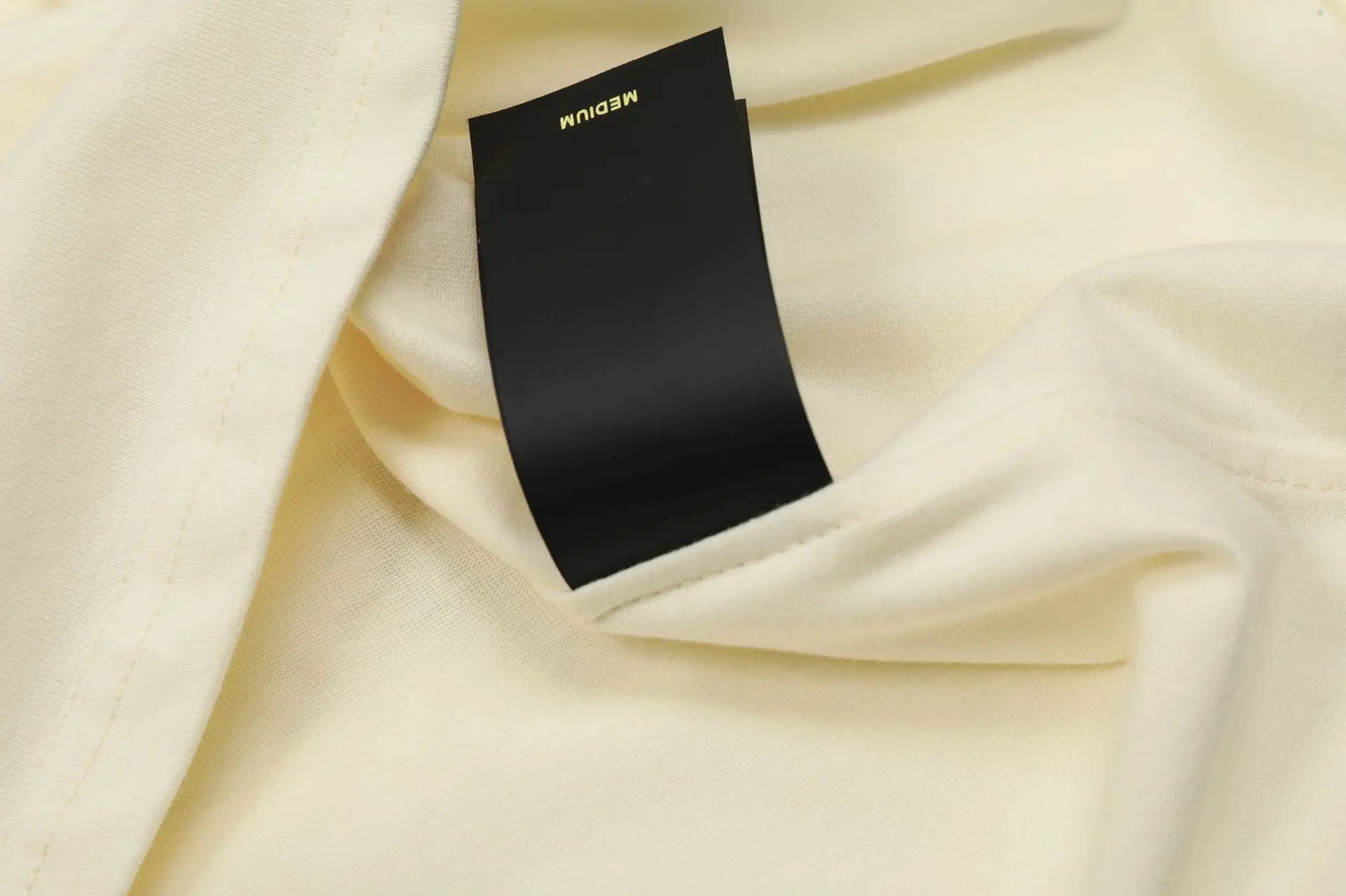 High Street Hip Hop Loose Tee in Ivory - Gallery Image 7 - Detailed View