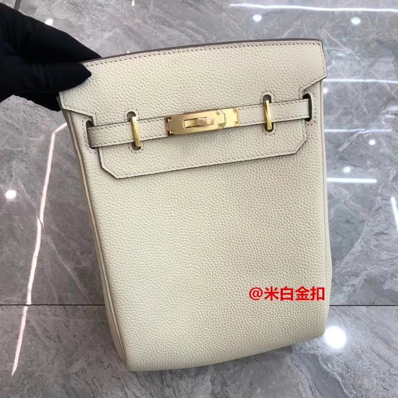 Hermès Crossbody Bags Kelly-style buckle closure, pebbled leather, wide strap — Milkshake White