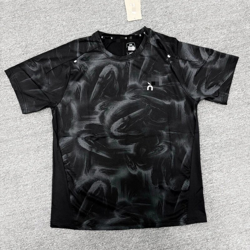 On Matching Sets Marble-print short-sleeve T-shirt and shorts set — Black top