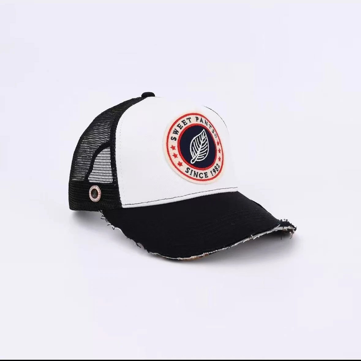 Sweet Pants Hats Mesh Trucker Cap with Embroidered Patch and Distressed Brim — Black (black under camouflage on brim)