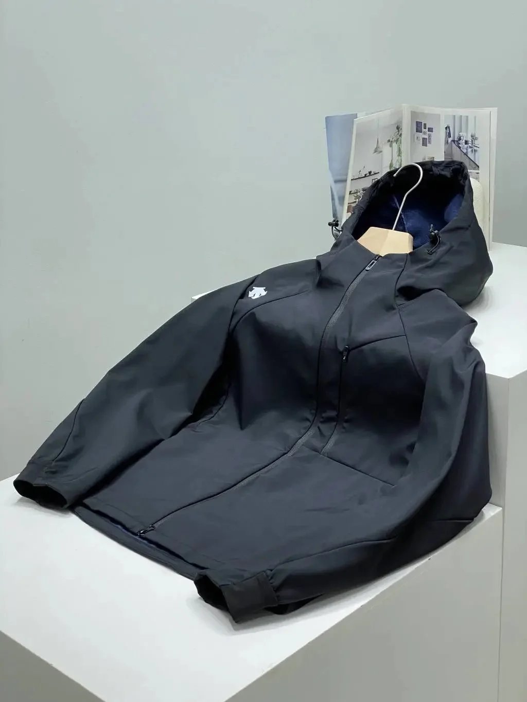 Descente Jackets Hooded zip-up jacket with chest zip pocket product image