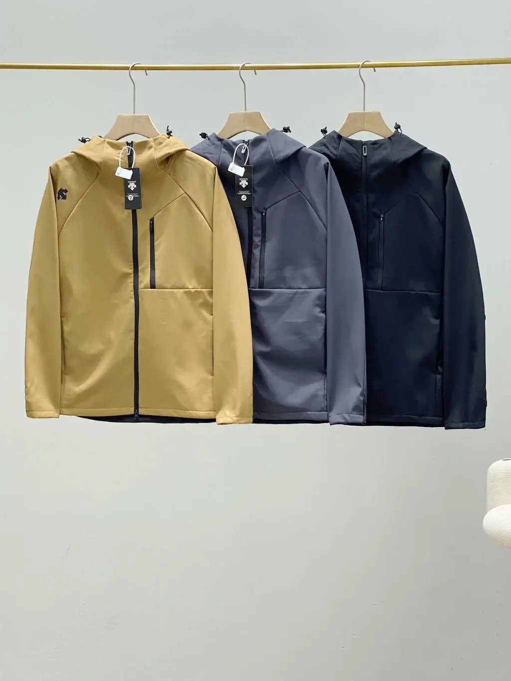Descente Jackets Hooded zip-up jacket with chest zip pocket product image