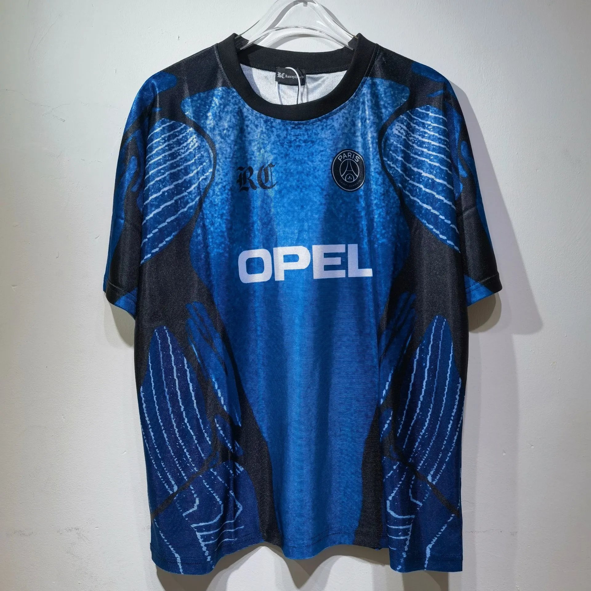 Palace Football Jerseys V-neck mesh jersey with graphic prints and number appliqués — CT042P Blue
