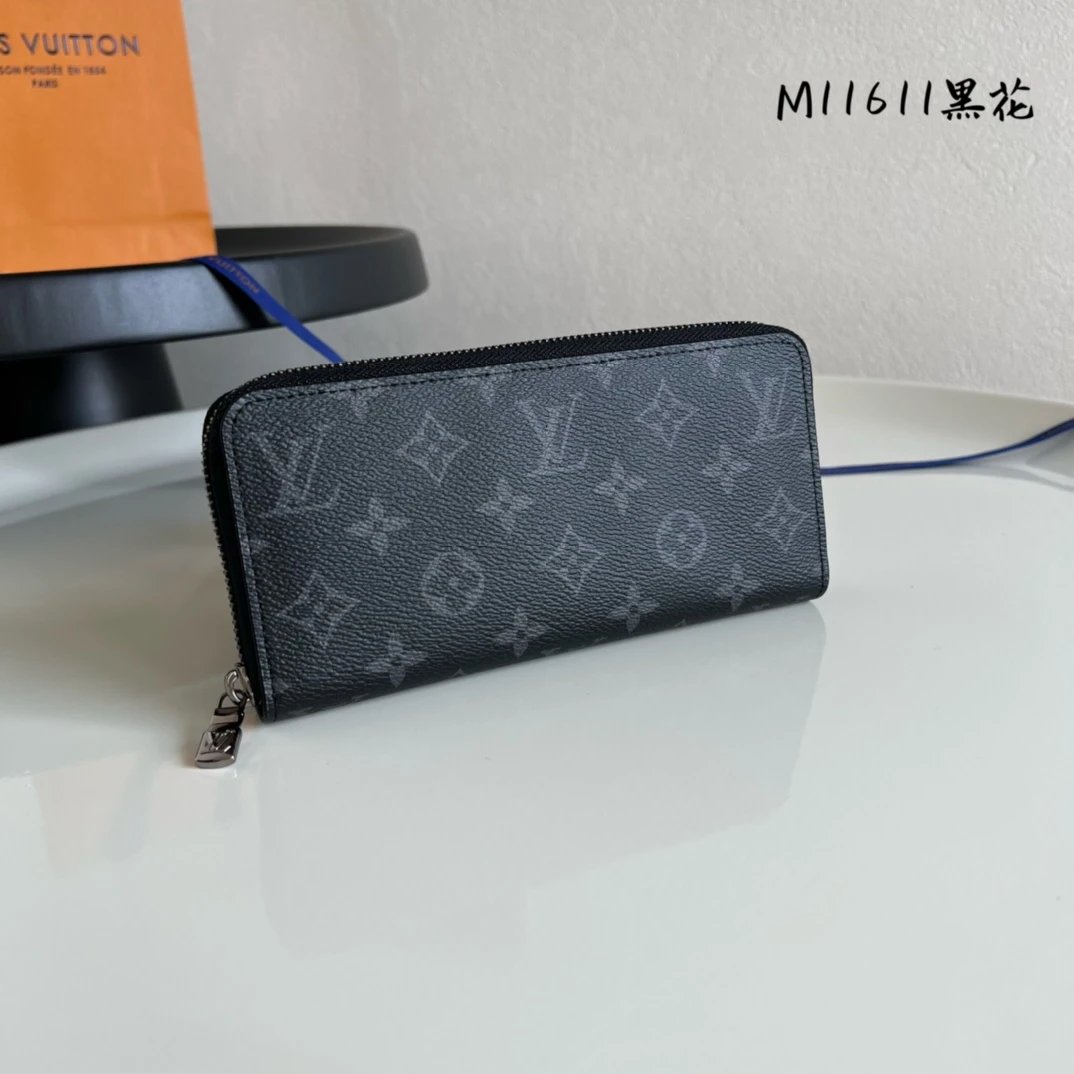 Genuine Leather Version of Louis Vuitton M11611 Black Monogram Zippy Wallet — Featuring spacious compartments, a zip coin pocket, and multiple card slots, this iconic Zippy Wallet is crafted from durable Monogram canvas and named for its secure wraparound zipper.