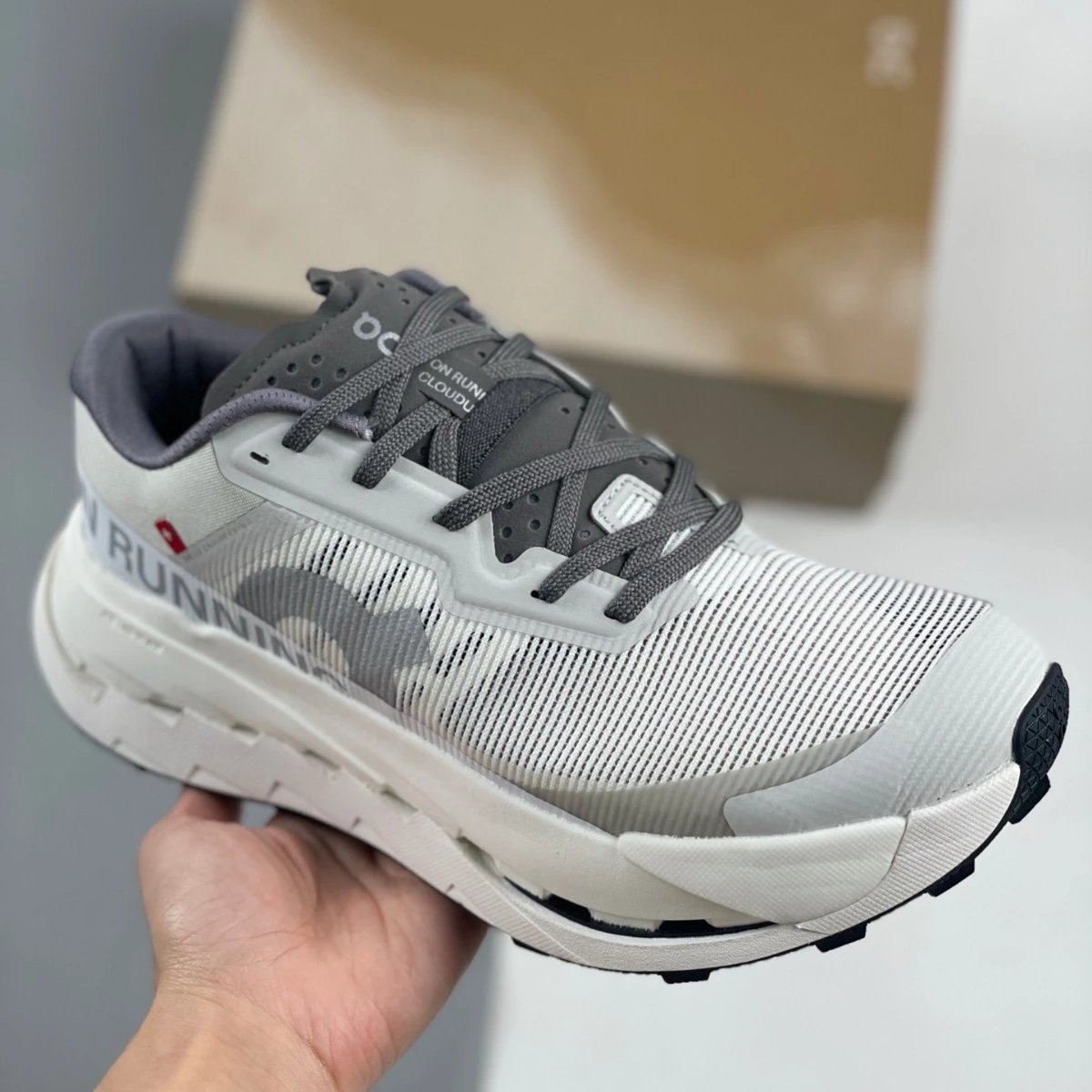On Cloudmonster Light Grey Orange Performance Running Shoes