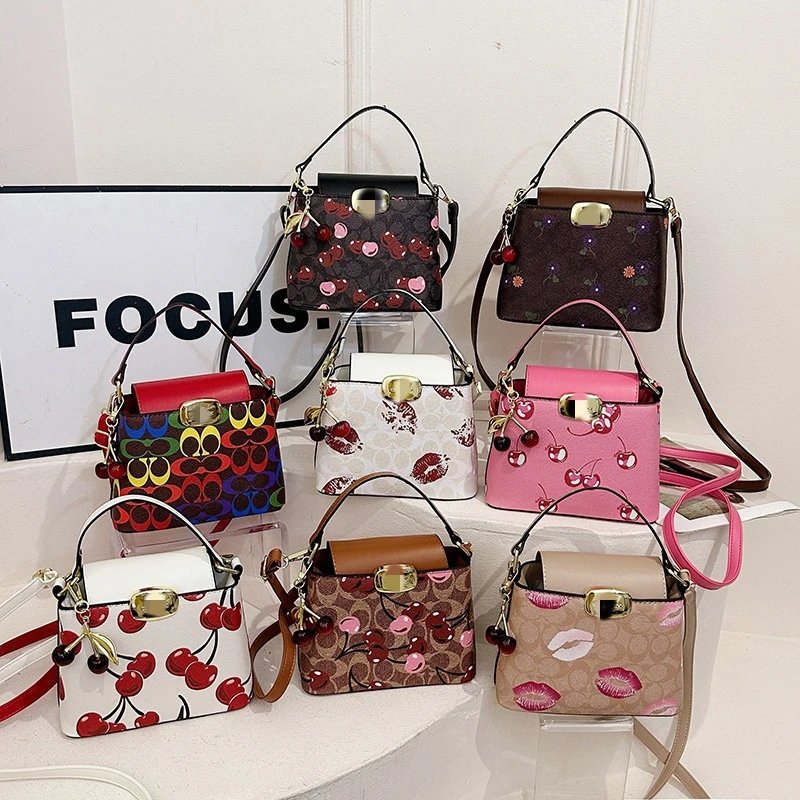 Coach Mini Top Handle Bag Cherry Print and Lip Motif Crossbody Handbag