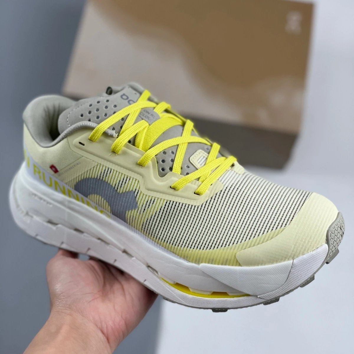 On Cloudmonster Light Grey Orange Performance Running Shoes