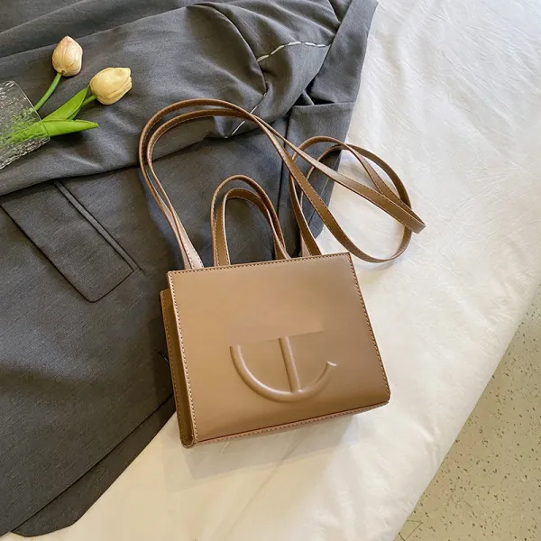 Design Mini Tote Bag in Beige with Embossed Logo Handbag - 1
