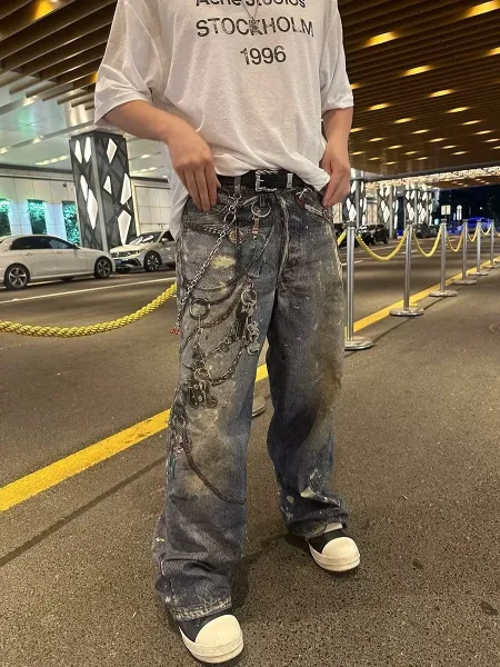 Off-White Industrial Chain-Decorated Distressed Wide-Leg Jeans - 8