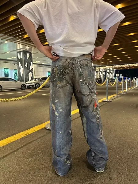 Off-White Industrial Chain-Decorated Distressed Wide-Leg Jeans - 12