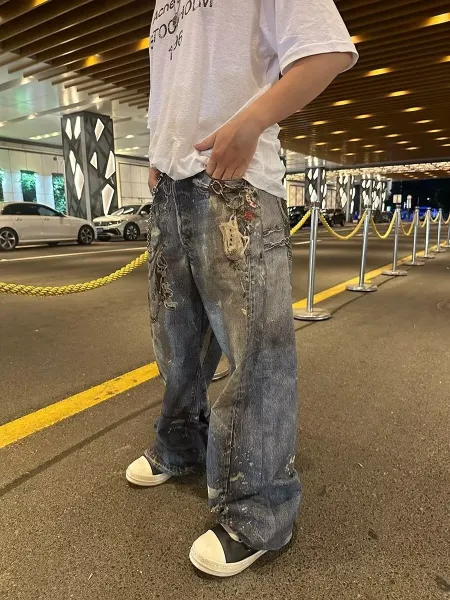 Off-White Industrial Chain-Decorated Distressed Wide-Leg Jeans - 9