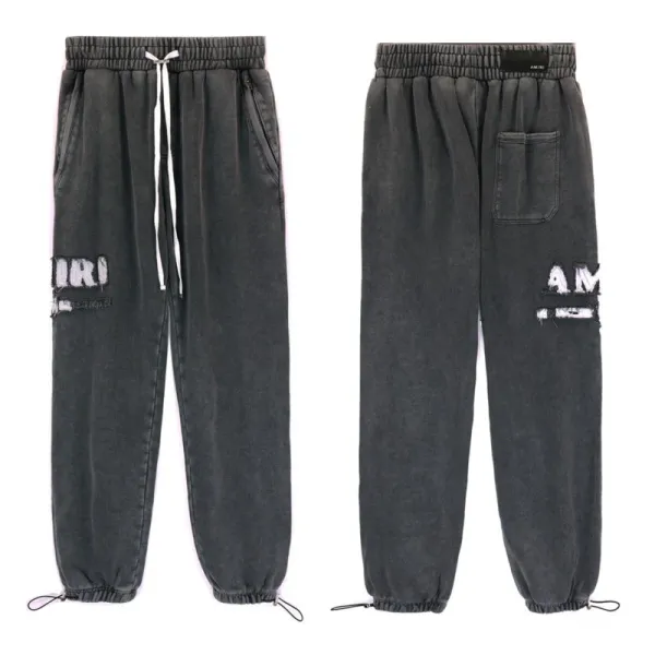 AMIRI Distressed Washed Black Sweatpants - 1