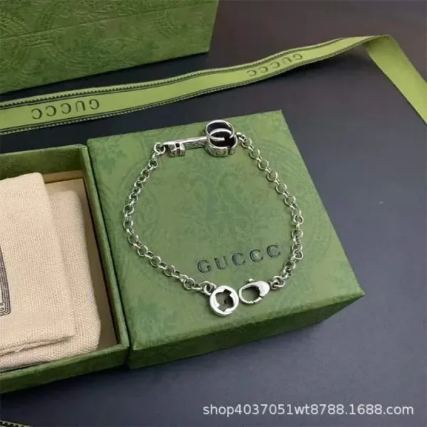 Gucci Key and Padlock Charm Silver-Tone Chain Bracelet - 1