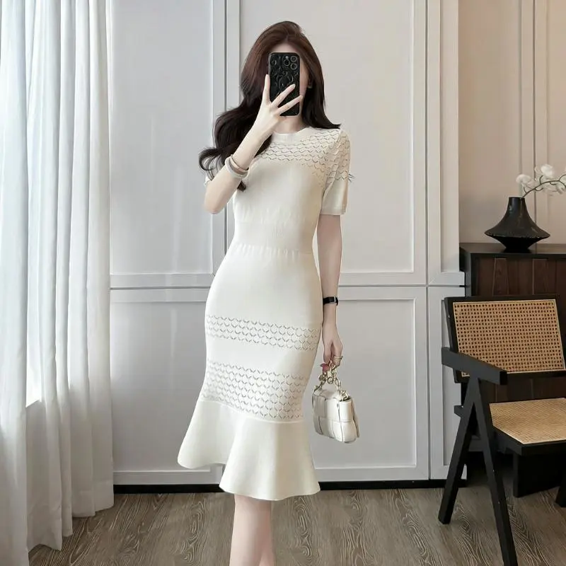 Summer style round neck short-sleeved hollow ice silk knitted dress for women with small fragrant waist and mid-length fishtail skirt