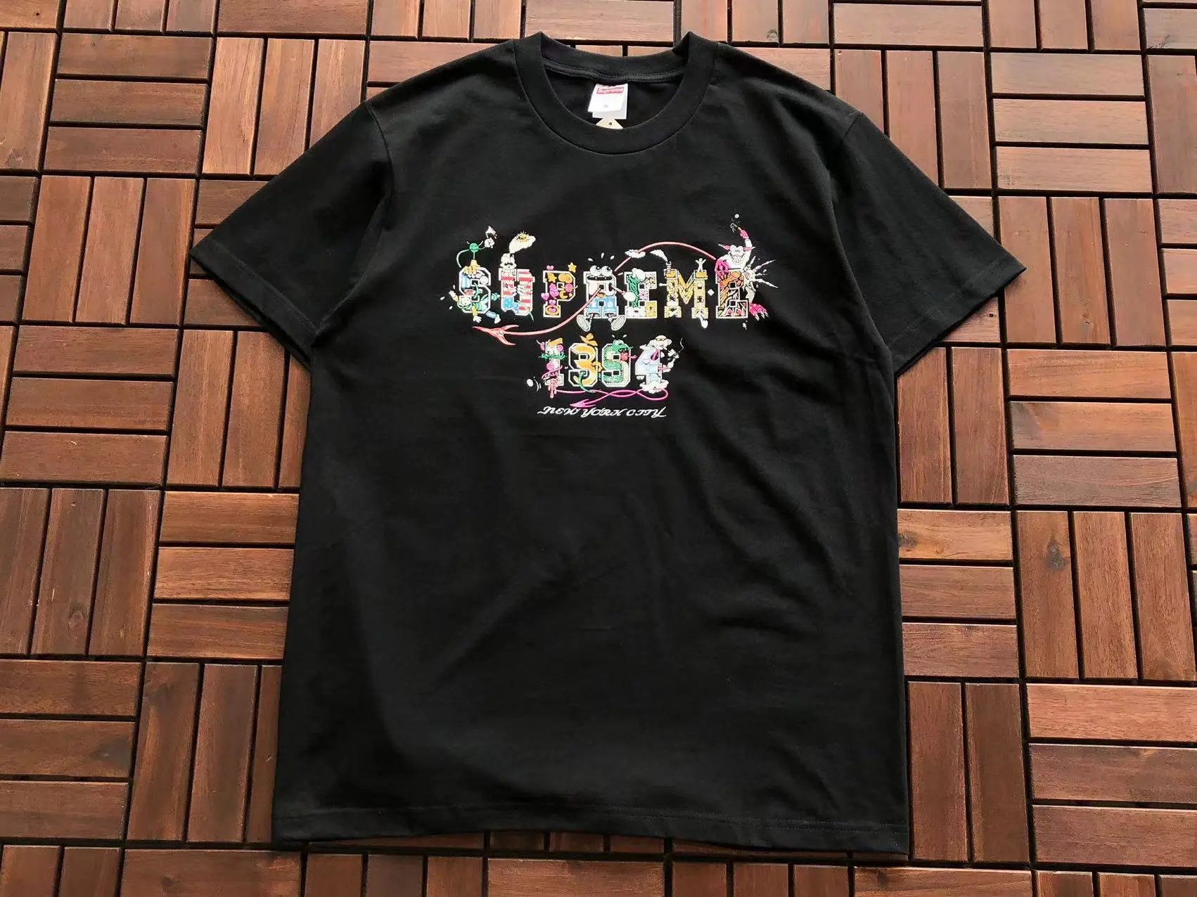 B382 24 VARSITY TEE Black