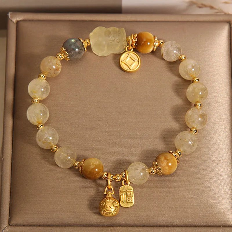Natural blonde crystal moonstone bracelet for women who swallow gold beast titanium crystal yellow hair crystal bracelet as a gift for girlfriend and best friend