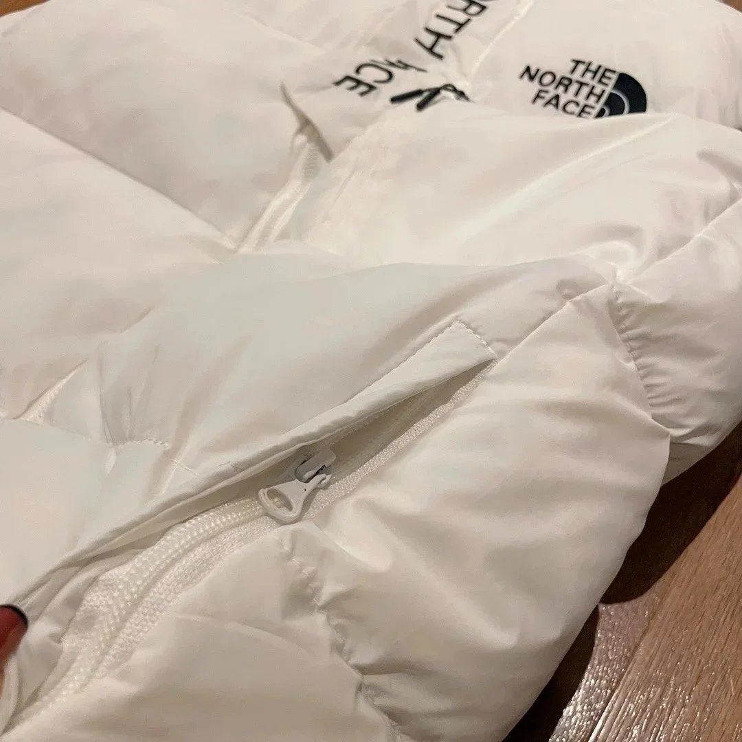 The North Face Down Jackets Hooded quilted puffer image 13