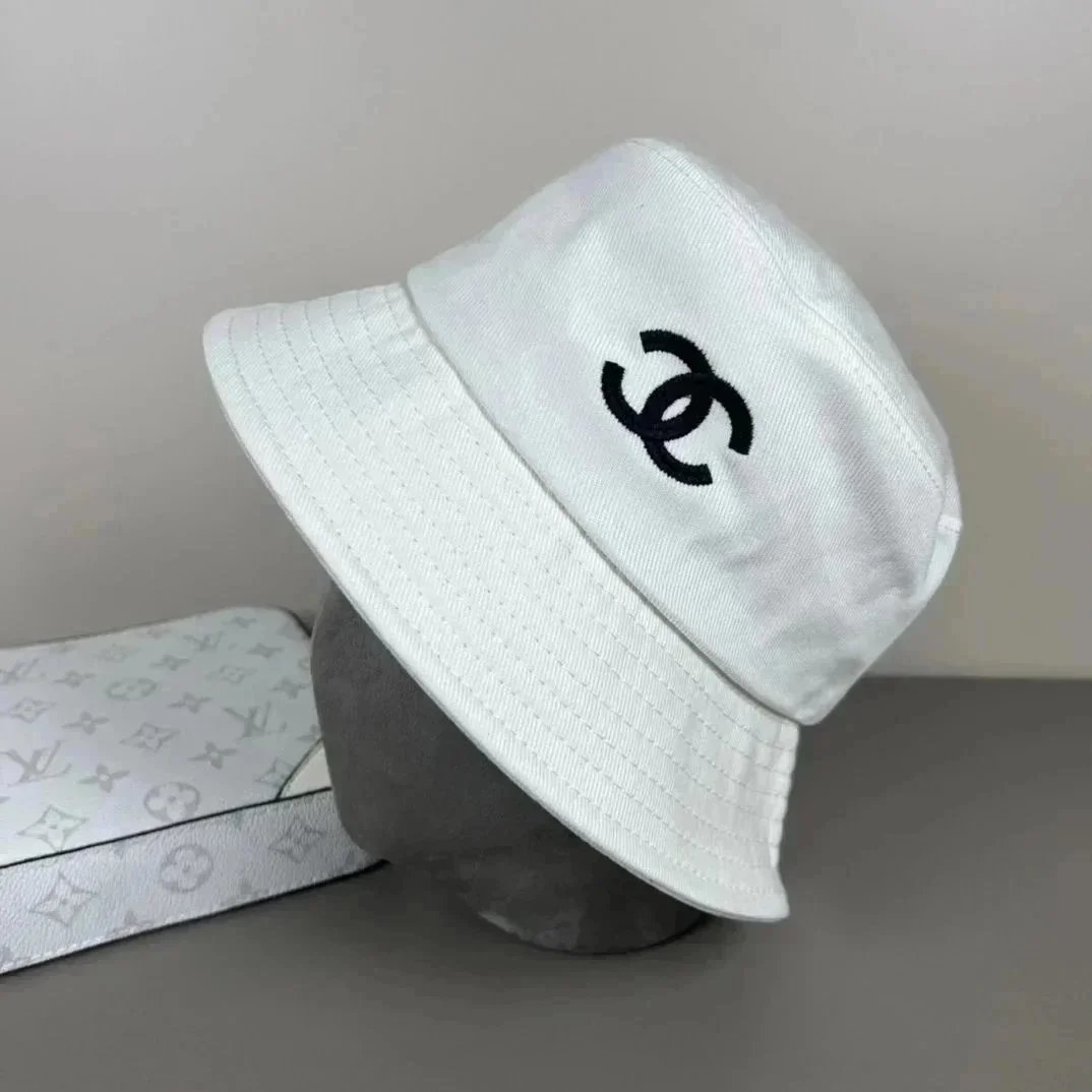 Chanel Hats Logo-embroidered baseball caps and bucket — 38