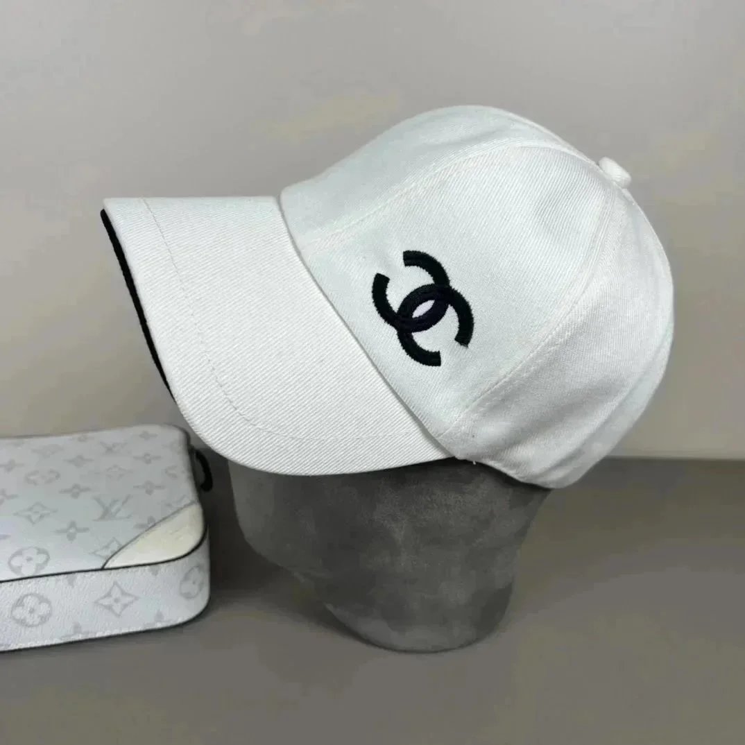 Chanel Hats Logo-embroidered baseball caps and bucket — 35