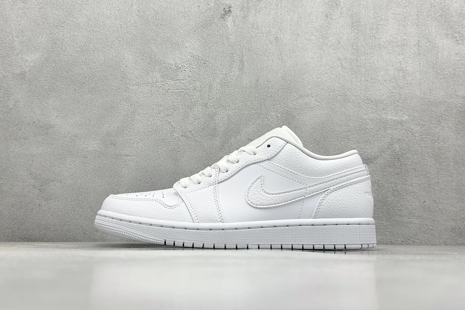 Nike Air Jordan 1 Low Triple White Leather Sneakers