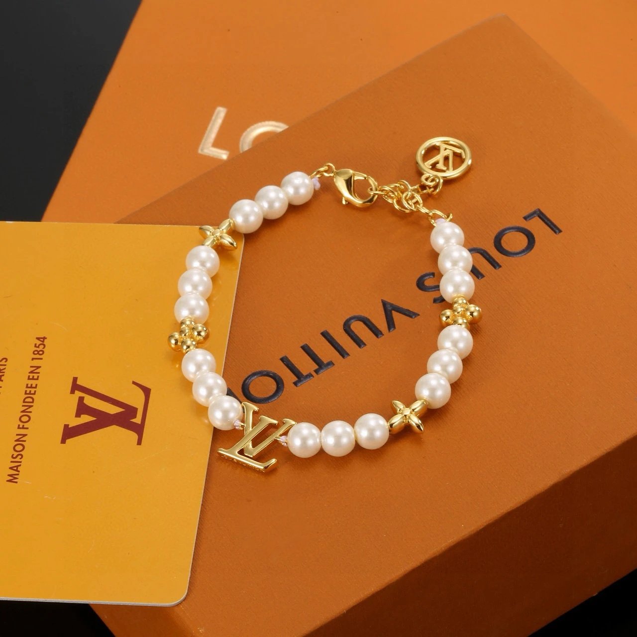 Louis Vuitton Pearl Bracelet Gold LV Charm Accessory