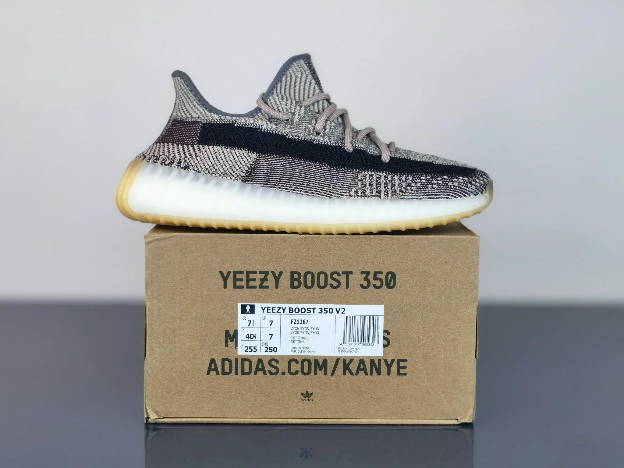 Yeezy Grey White Knit Low Top Sneakers