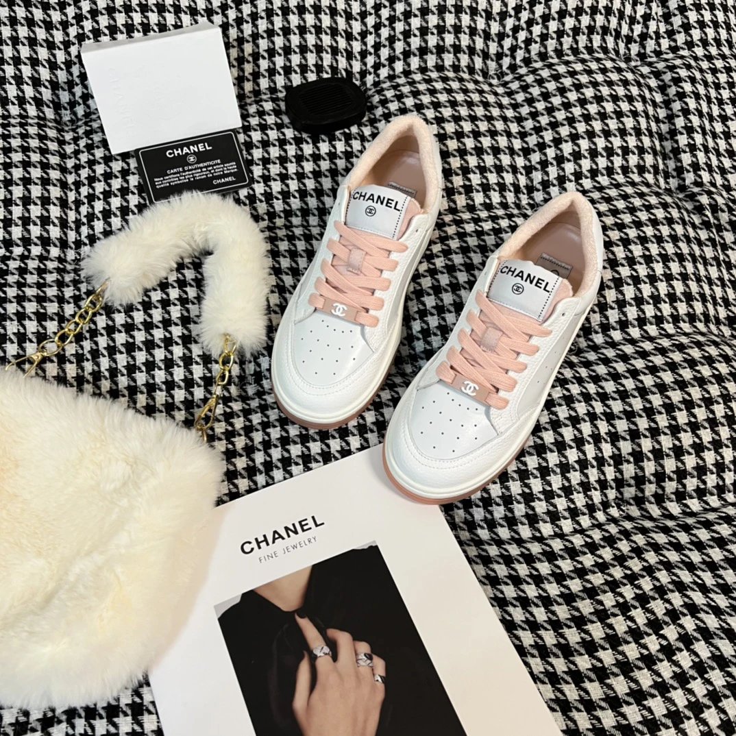 Chanel Women’s White Pink Leather Low Top Sneakers