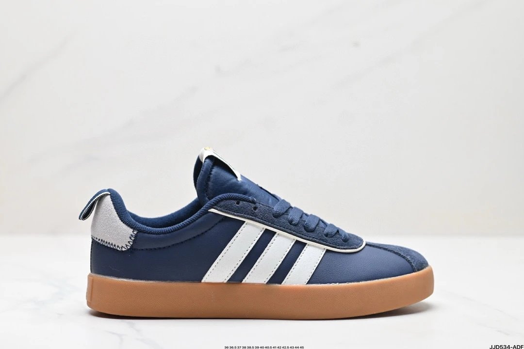 Adidas Navy Leather Low Top Gum Sole Skate Sneakers