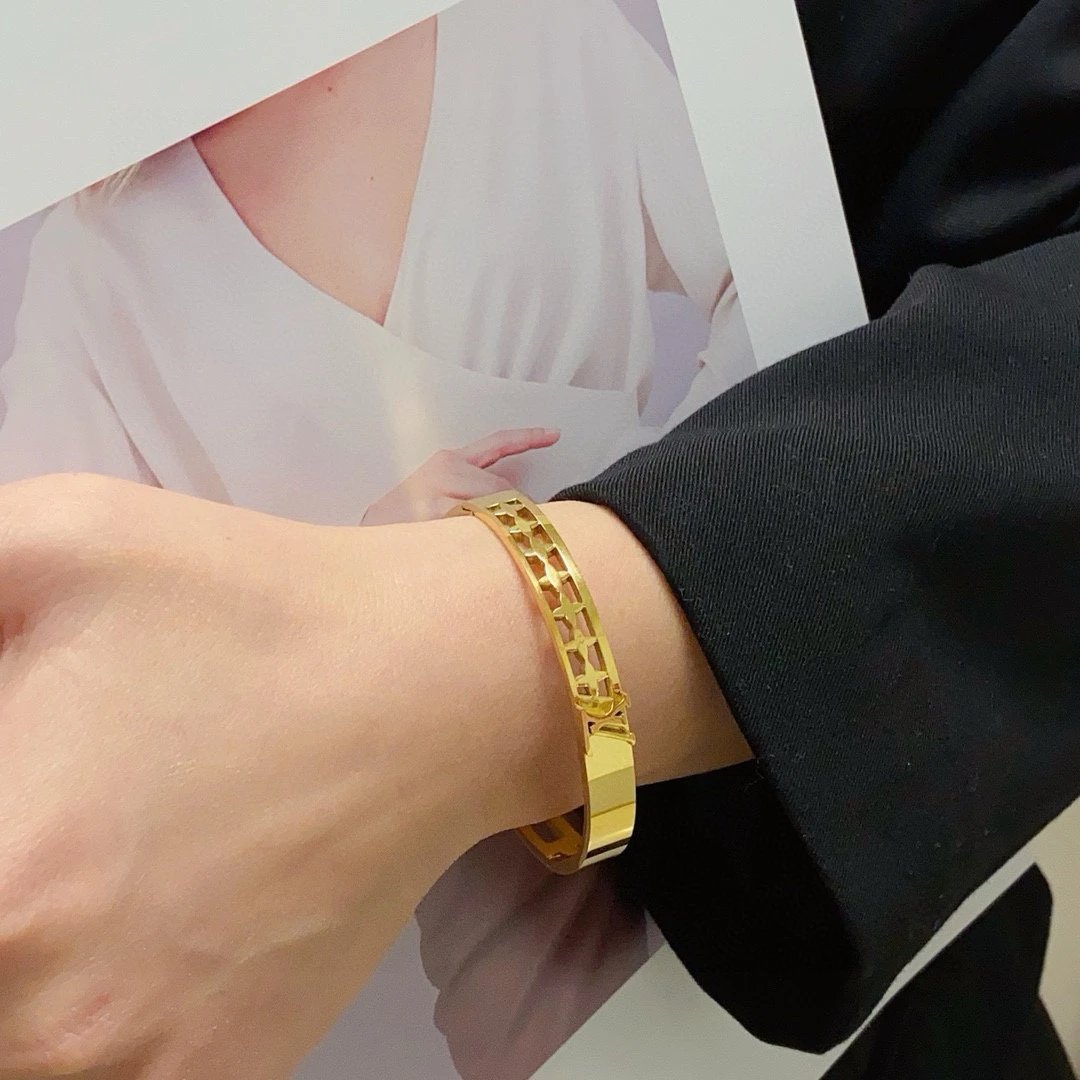 Louis Vuitton Gold Monogram LV Charm Bangle Bracelet