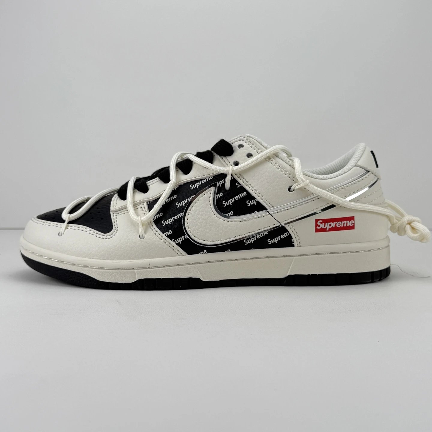 Nike Dunk Low Supreme Black White Leather Sneakers