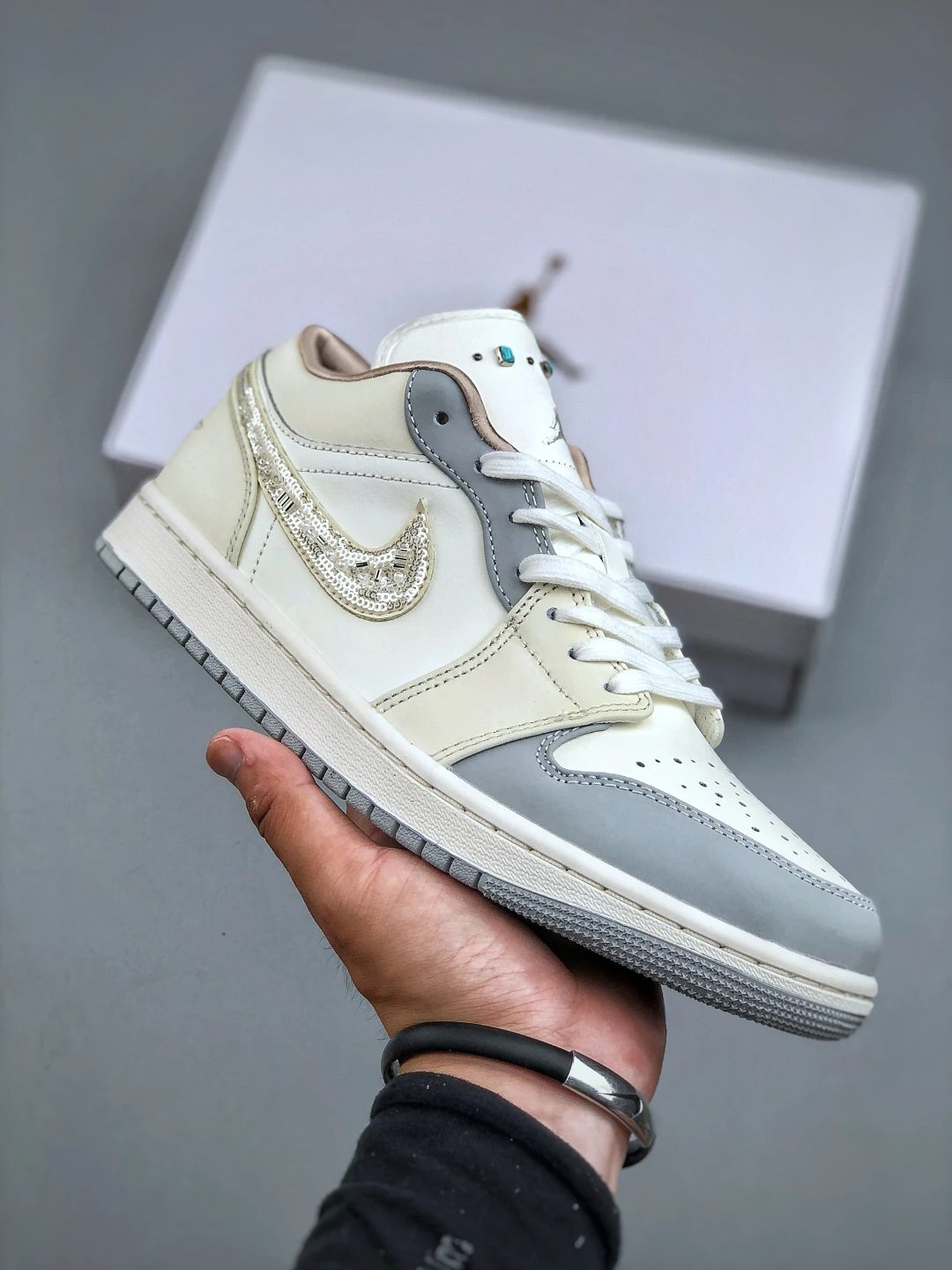 Air Jordan 1 Low Cream Grey Rhinestone Swoosh Sneakers