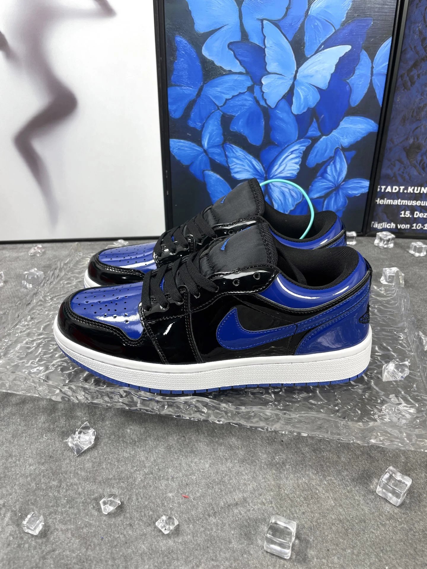 Nike Air Jordan 1 Low Black Royal Blue Patent Sneakers