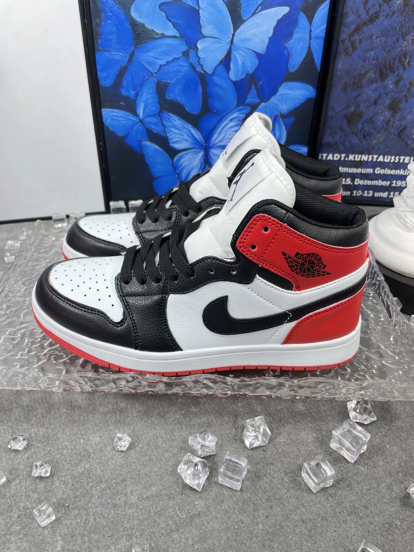 Air Jordan 1 Mid Black White Red Leather Sneakers