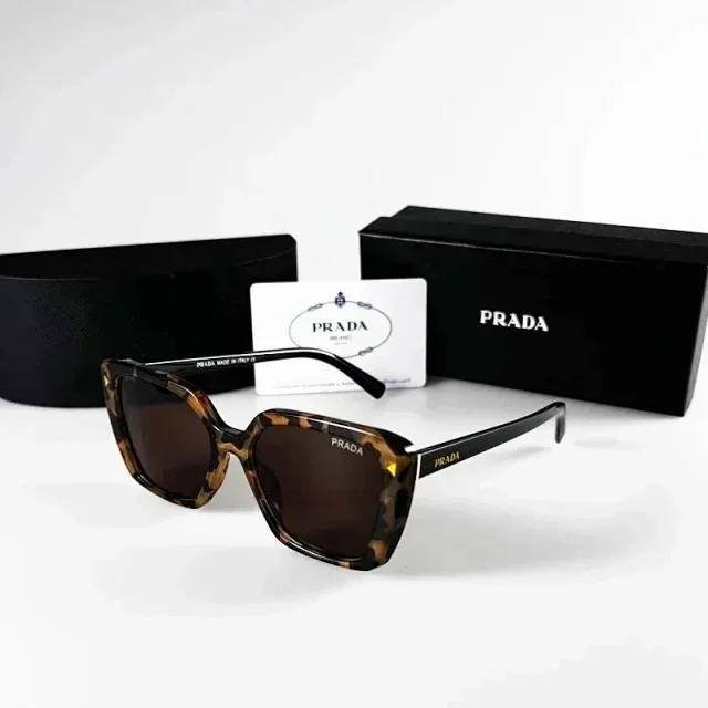 Prada Eyewear Sunglasses with round or geometric metal frames product detail image 17