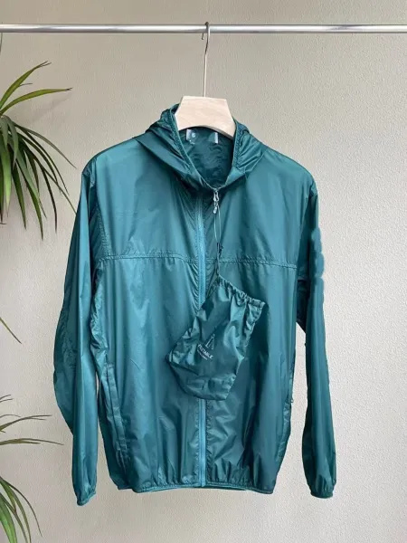 Design Pleasurable Packable Hooded Windbreaker Teal Green Outerwear Outerwear.windbreaker - 1