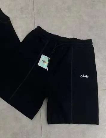 Comme des Garçons Play Black Embroidered Shorts - 1