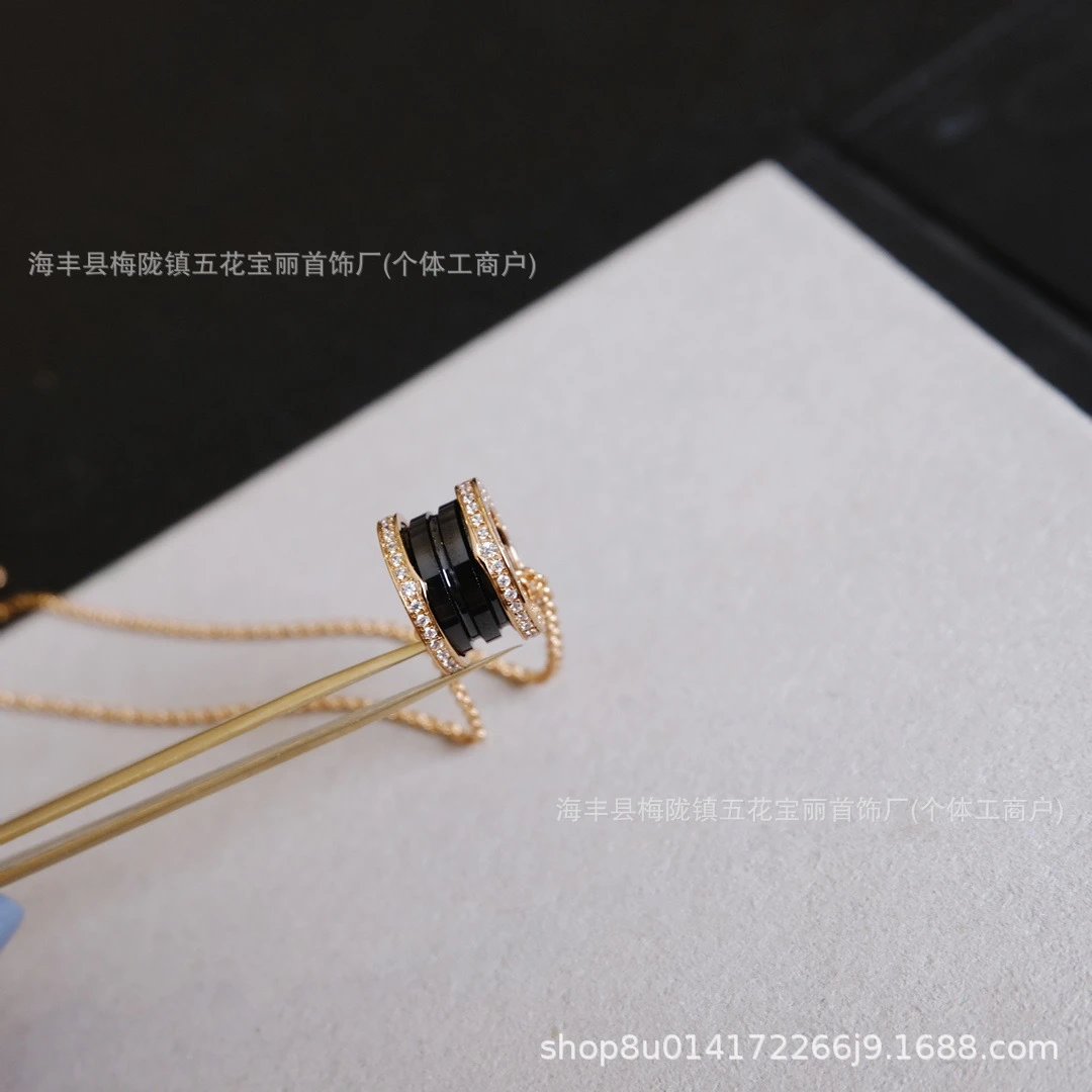 Design Stacking Ring Pendant Necklace with Black Onyx and Pave Diamonds on Gold Chain Jewelry