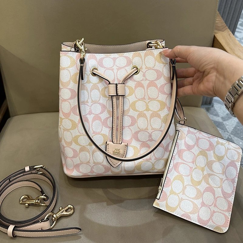 Coach Bucket Bag with Signature C Print in Pink and Beige