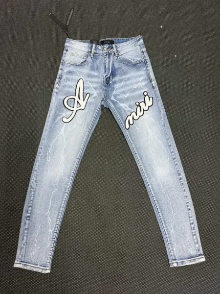 Amiri Lightning Bolt Embroidered Slim Fit Light Wash Jeans - 1