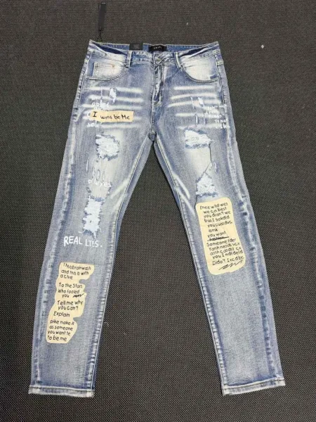 Amiri Embroidered Logo Distressed Slim Fit Jeans - 31