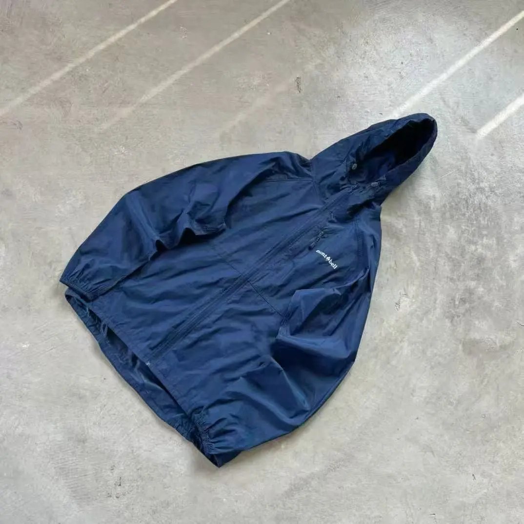 Design Montbell Storm Cruiser Jacket Dark Green Windbreaker - 13
