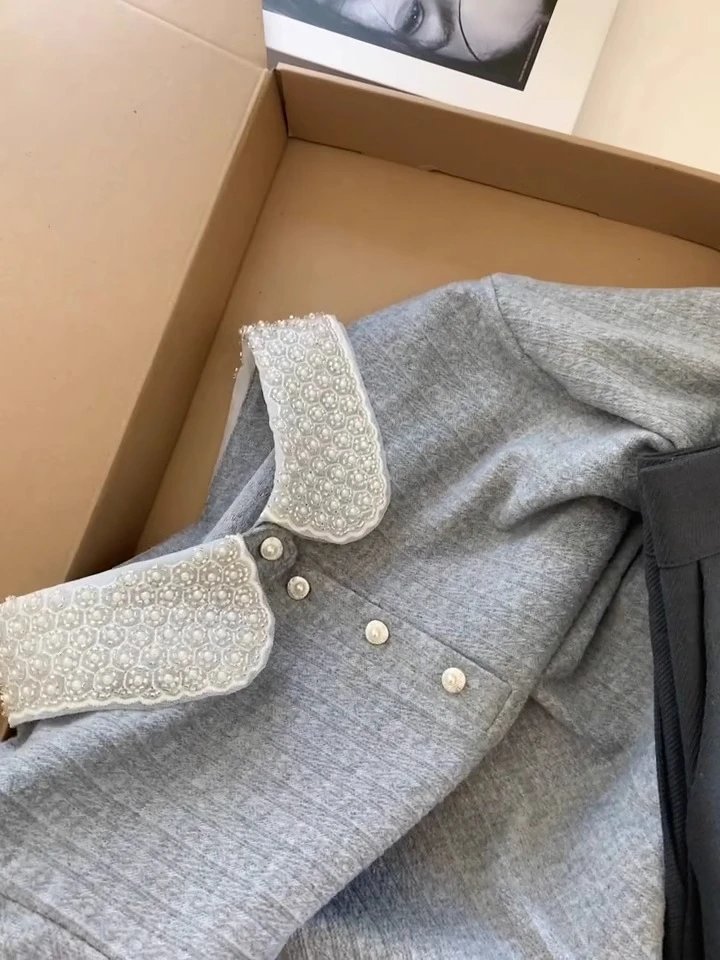 Design Peter Pan Collar Knit Polo in Gray with Pearl-Embellished Collar and Black Pleated Pants Tops Polo - 7