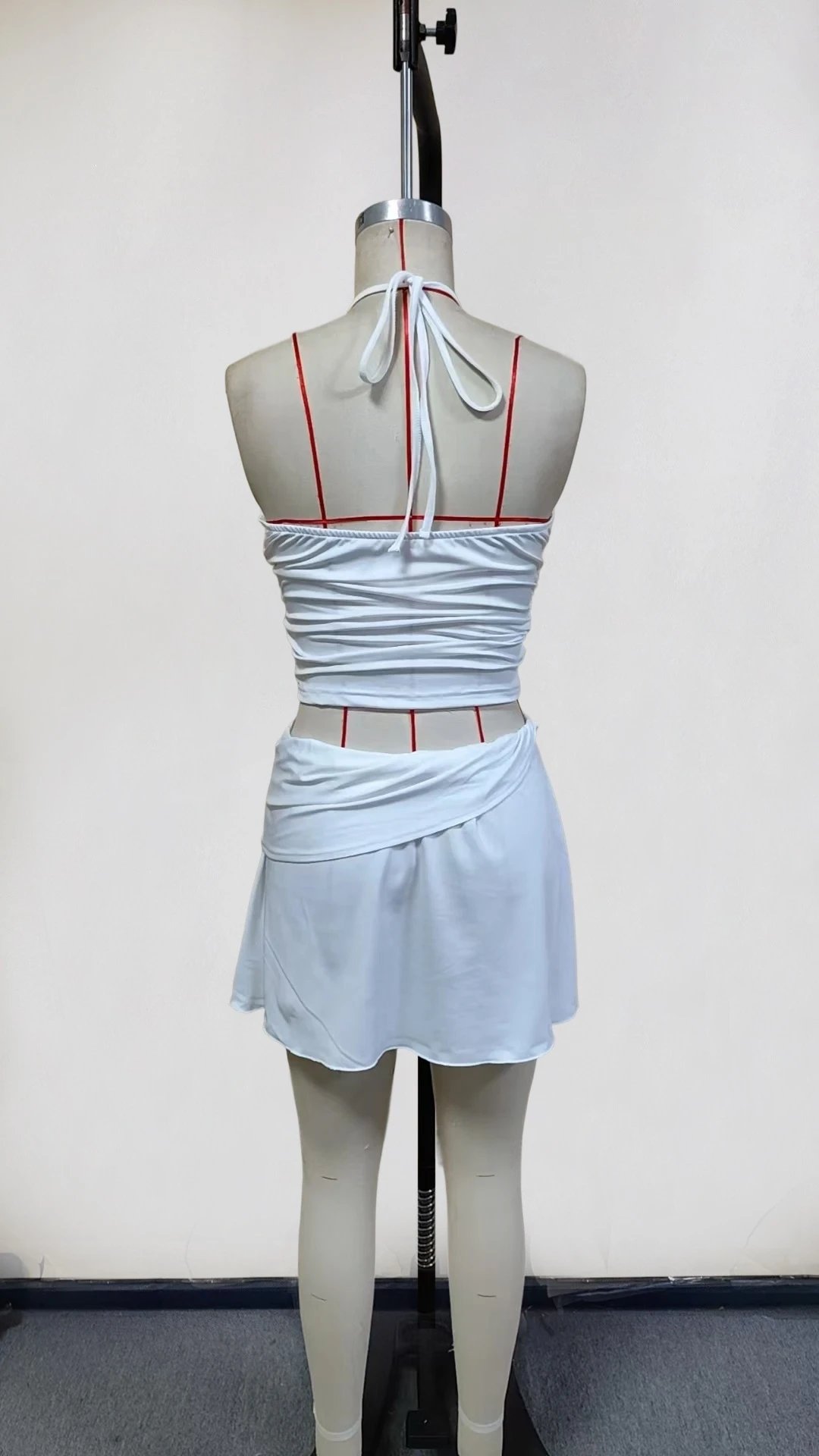 Design Halter Neck Cut-Out Crop Top and Pleated Mini Skirt Set in White - 4
