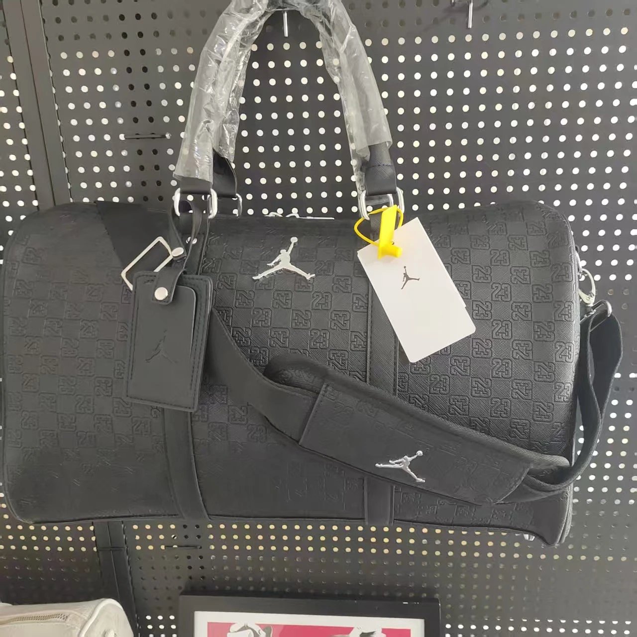Black and Silver Leather Travel Bag with Studded Bottom